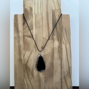 Brown/grey agate quartz pendant with waxed cord
